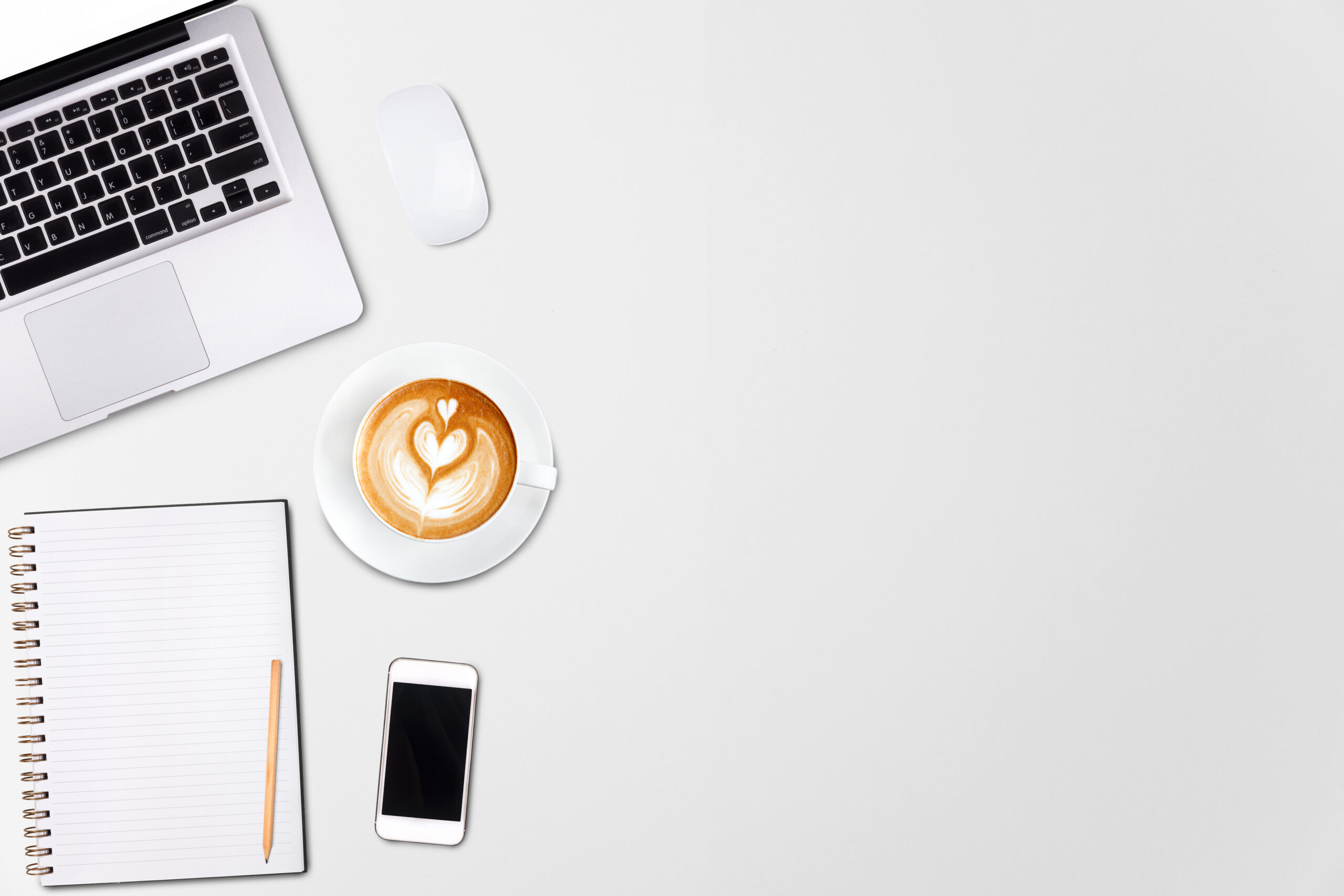 top view laptop computer or notebook,mobile phone and cup of lat
